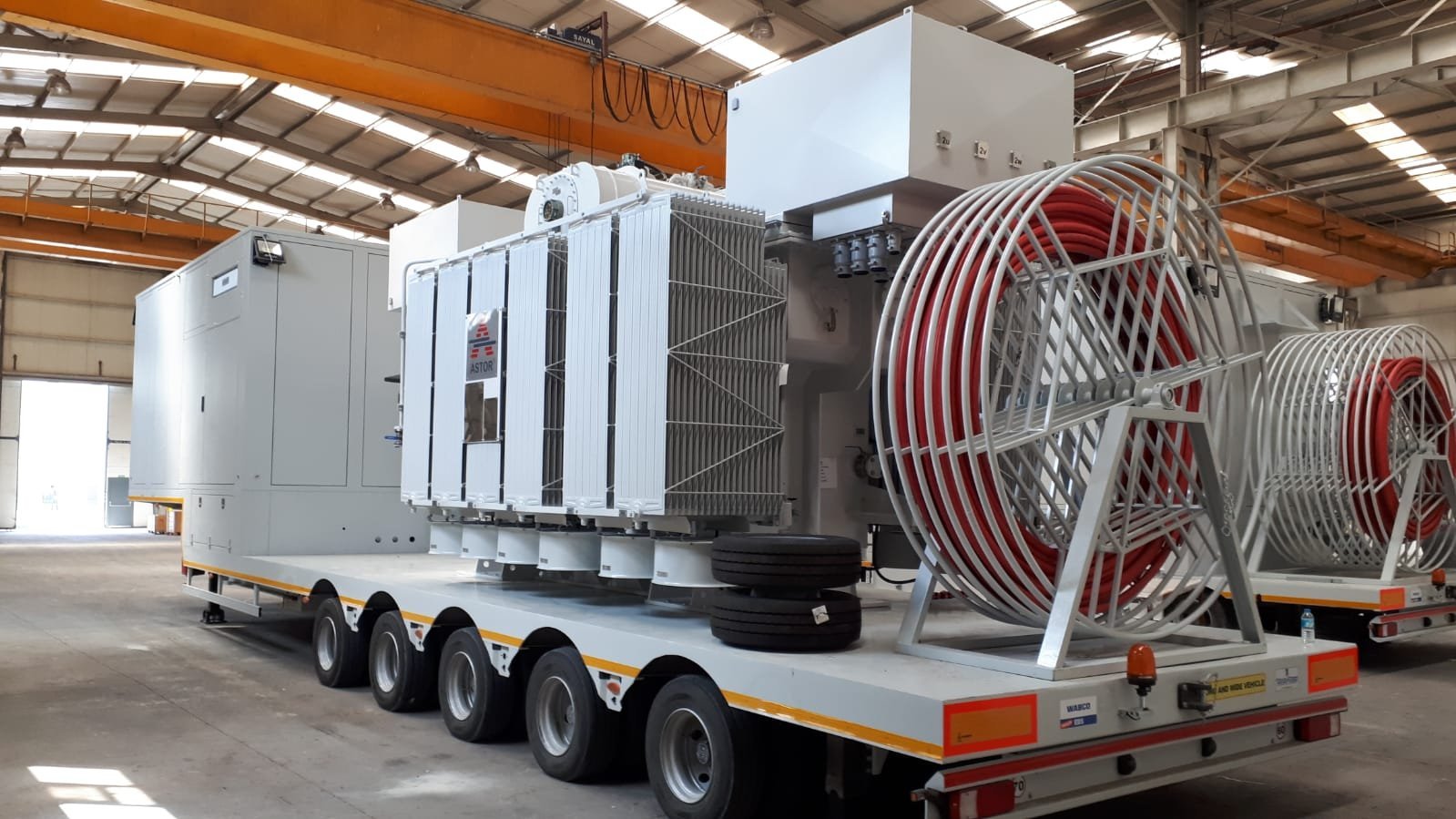 A large machine on a trailer
Description automatically generated