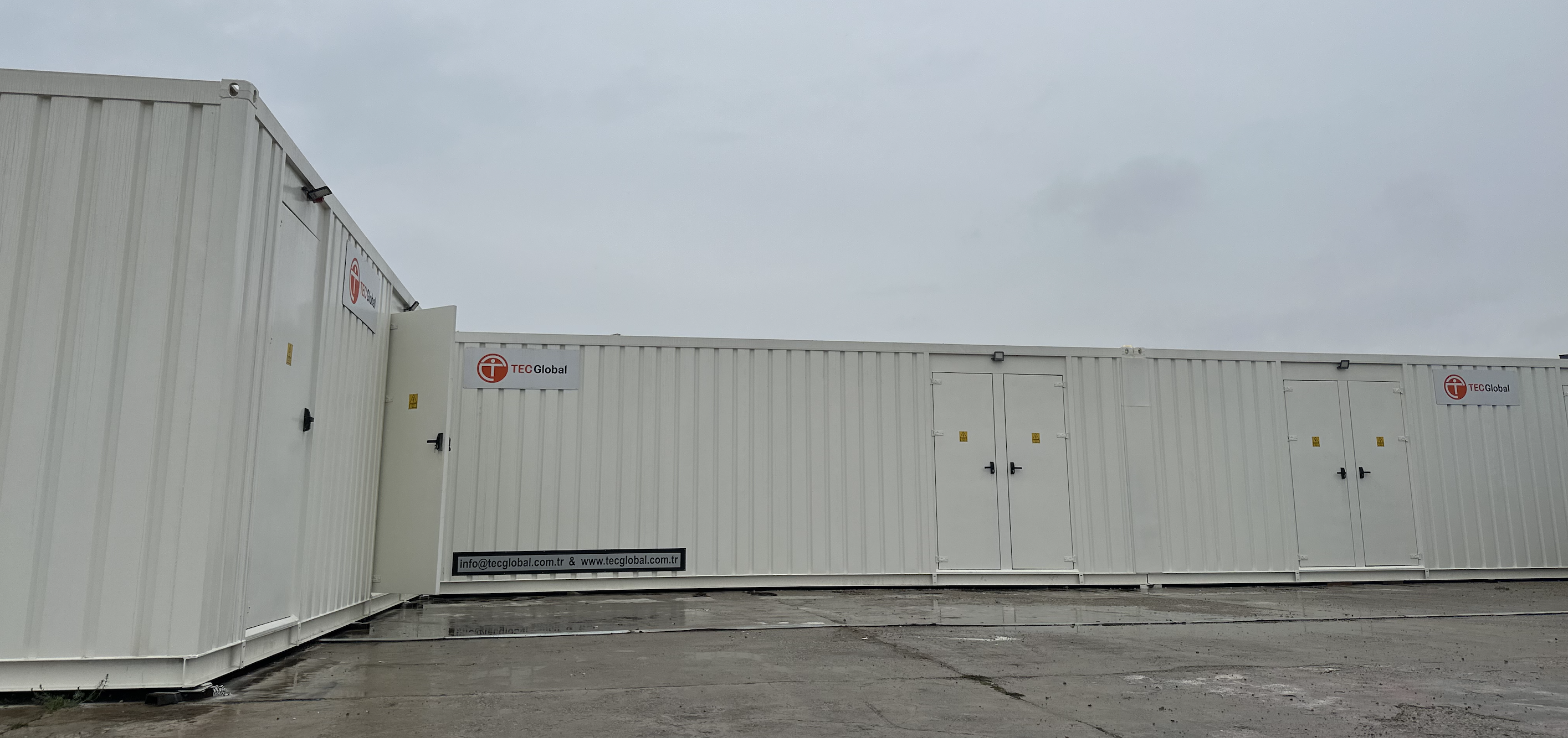 A white container with a door
Description automatically generated
