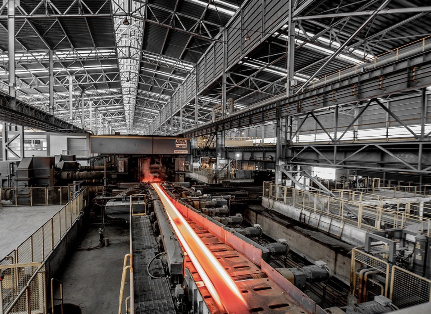 A long shot of a factory
Description automatically generated